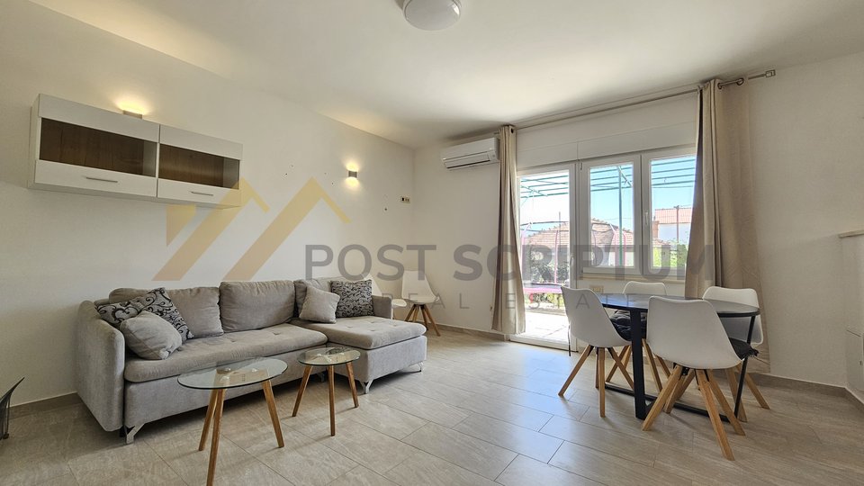 COMFORTABLE THREE BEDROOM APARTMENT WITH PARKING AND GARDEN